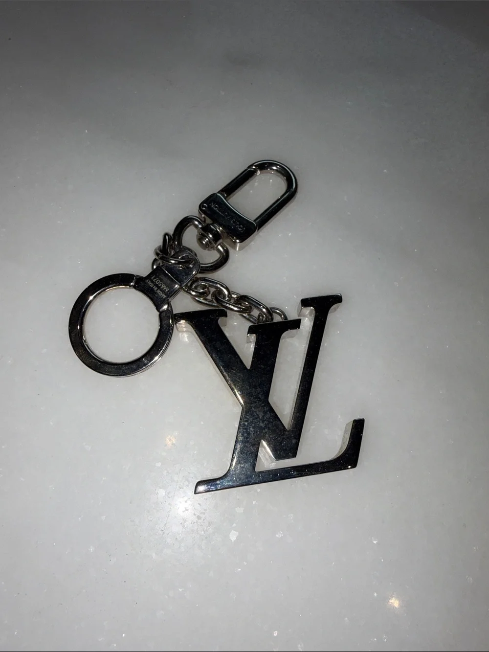 Louis Vuitton Silver LV Logo Keyring